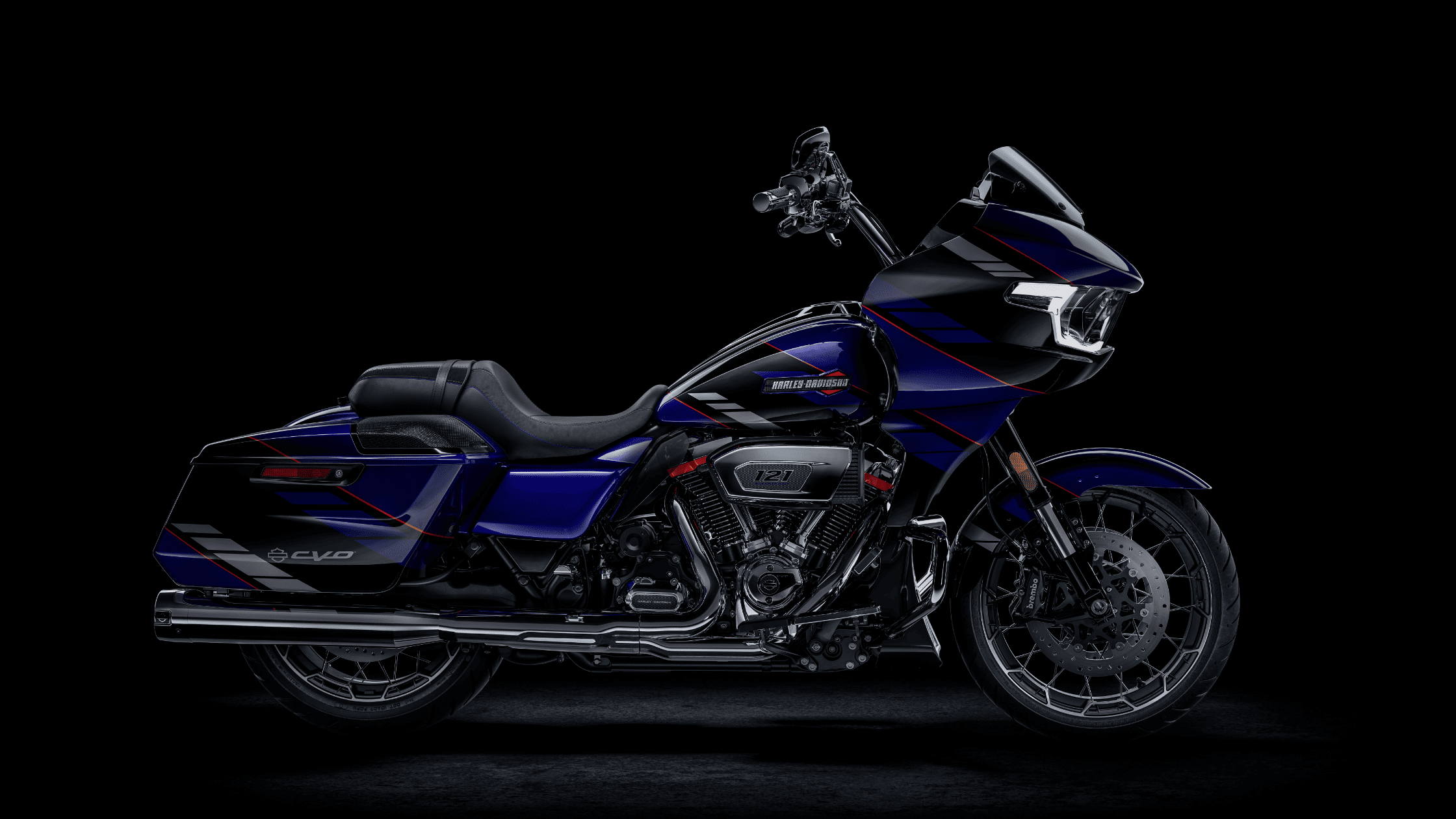 2025 Harley-Davidson CVO Road Glide in blue and black finish, profile view on black background