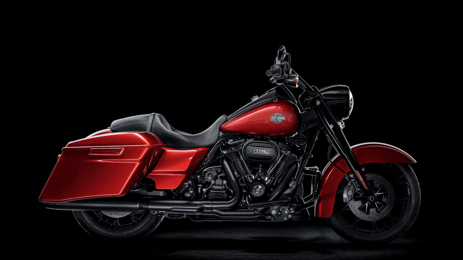The 2025 Harley-Davidson&reg; Road King&reg; Special in striking red and black, showcasing bold style and po...